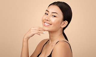 Portrait of beautiful woman with smooth skin