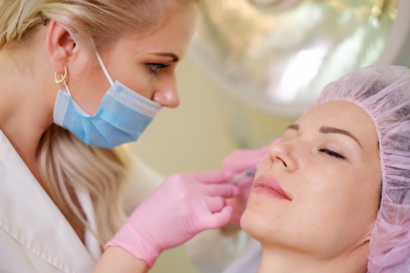 a woman receiving Botox