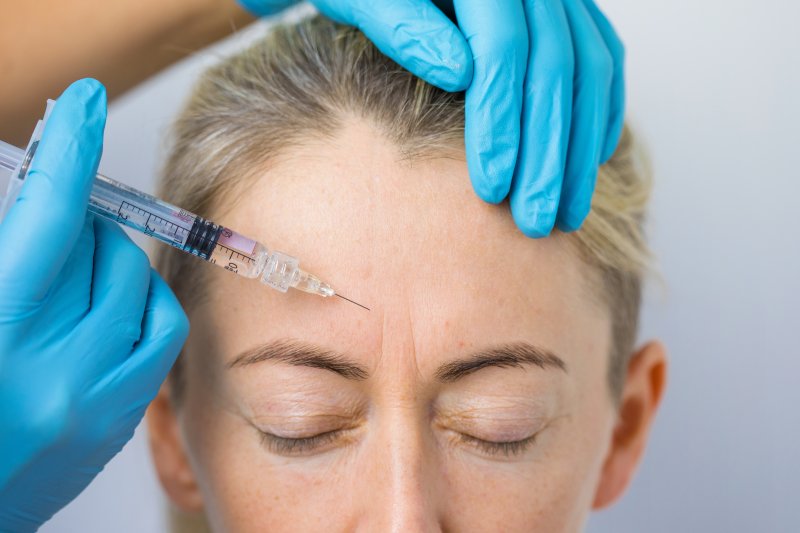 a woman receiving Botox 