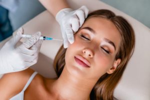 young woman getting BOTOX injections