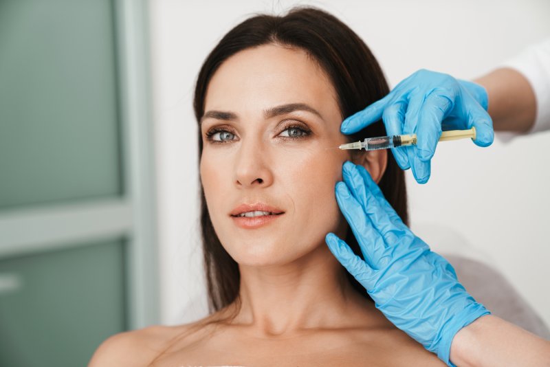 a woman receiving Botox