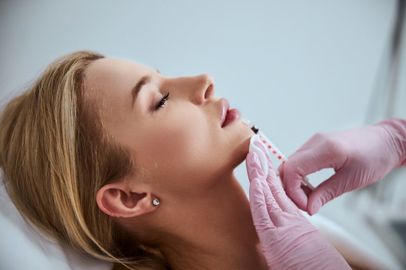 woman receiving dermal fillers 