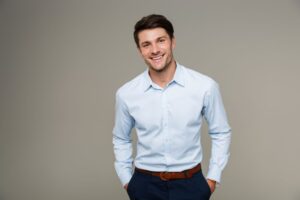 Smiling, handsome man wearing business attire 
